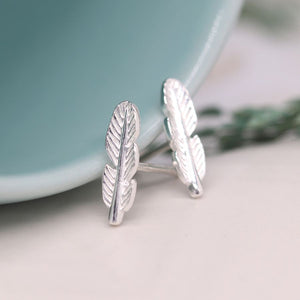 Pom - silver tiny feather studs