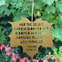 Load image into Gallery viewer, Leaf Quote - And the secret garden bloomed and bloomed - Frances Hodgson Burnett: Gold
