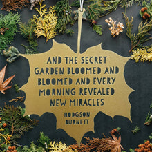 Load image into Gallery viewer, Leaf Quote - And the secret garden bloomed and bloomed - Frances Hodgson Burnett: Gold
